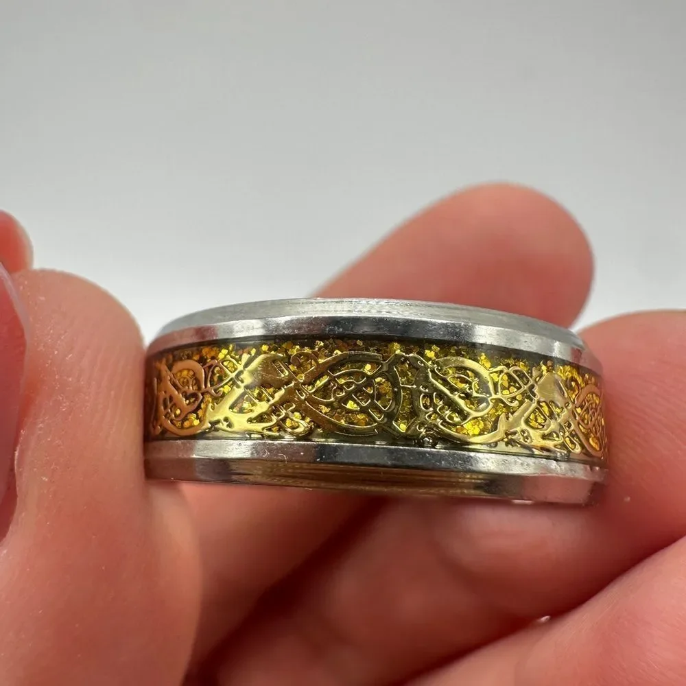 Men's size 13, Silver tone‎ metal with silver/gold scroll work in center, ring!
